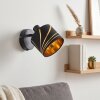 Wandlamp Alsen met verstelbare lampkop, stoffen lampenkap met goudkleurige gebogen sleuven