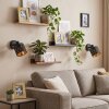 Retro-wandlamp Alsen, set van 2, goud-zwarte kap met uitsparingen, draai- en zwenkbare lampkop