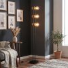Staande lamp Voril met drie houten houders, zichtbare E27-fitting en voetschakelaar