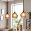 Retro-hanglamp Nolen in clusteropstelling met rookglazen kappen, montageverstelbaar