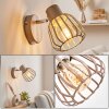 Wandlamp Keldor met bruine metalen kooikap, draai- en zwenkbare lampkop voor de leeshoek