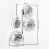 Moderne wandlamp Gastor met verticale lichtbalk en drie ronde rookglazen bollen