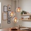 Moderne hanglamp Gastor, 3 amberkleurige bollen, bij montage verstelbaar