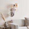 Moderne wandlamp Koyoto met drie glazen bollen in rookkleurig, amberkleurig en helder glas