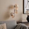 Moderne wandlamp Koyoto met drie amberkleurige en heldere glazen bollen