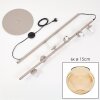 Moderne vloerlamp Koyoto met 6 amberkleurige glazen bollen, frame in zandkleur