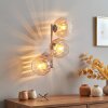 Glazen-bollen-wandlamp Koyoto met amberkleurige en heldere kappen, licht op de muur